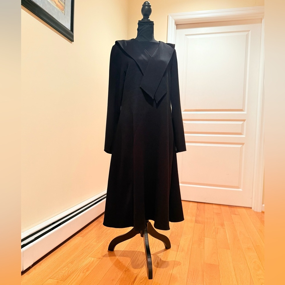 Elegant Black Dress with attached pieces of scarf on each side on the top.